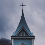 blue and white wooden church during daytime